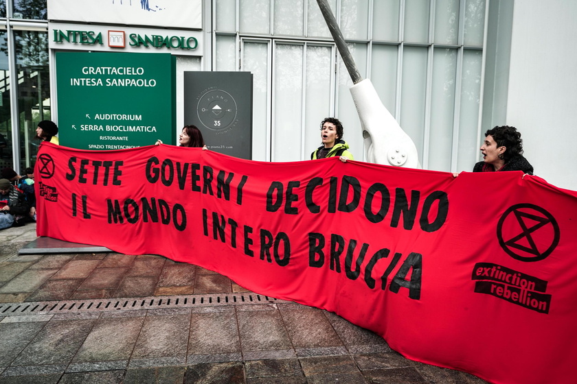 Extinction Rebellion protest at SanPaolo skyscraper in Turin ahead of G7